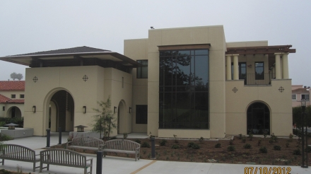 Modern architecture of Bishop's School Manchester Library, featuring large windows and an inviting entrance.